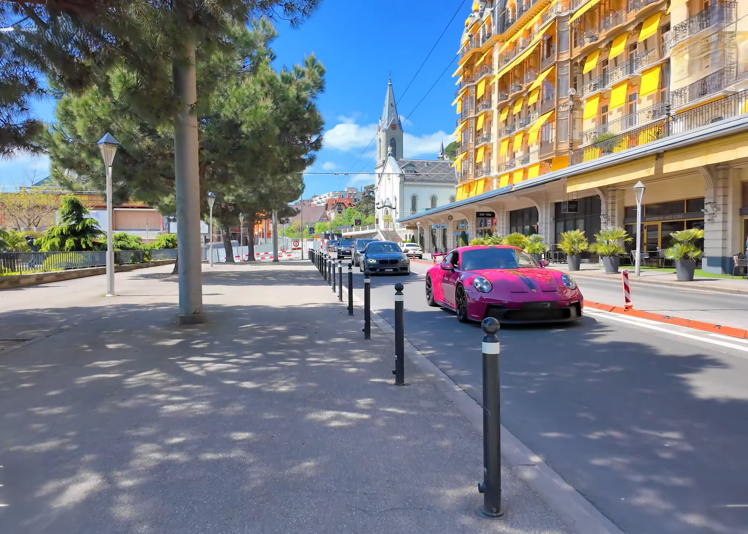 Street view in Montreux with church and hotel buildings