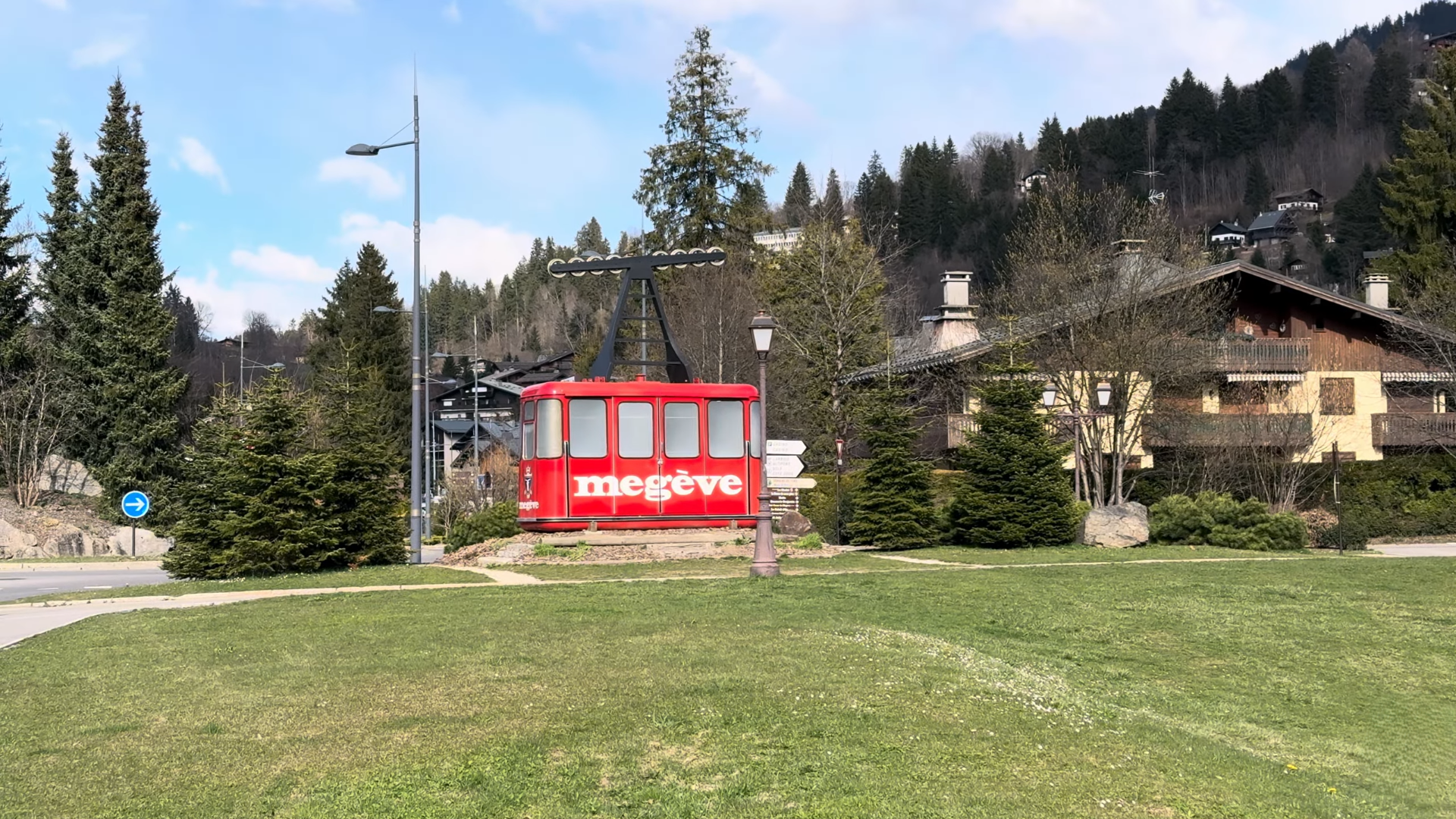 Megeve entrance sign and alpine village road